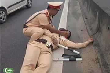 Tài xế container hất văng CSGT xuống đường có thể bị tội gì?