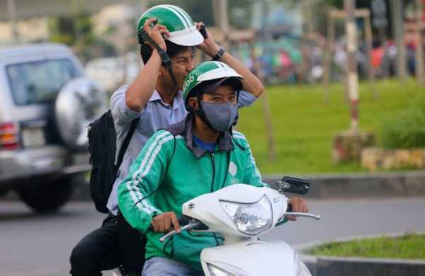 Tài xế Grab phải đeo khẩu trang và găng tay khi làm việc
